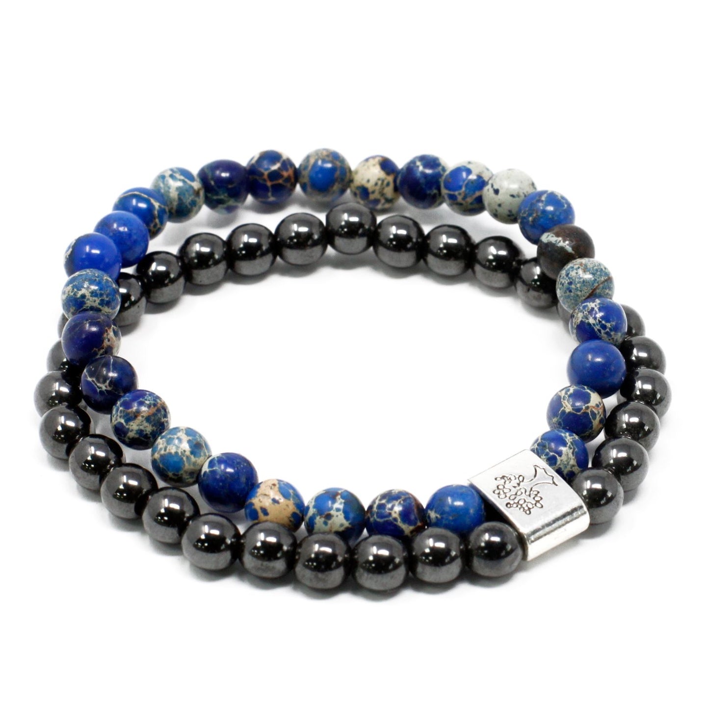 Stack of beaded bracelets with blue and black stones on a white background