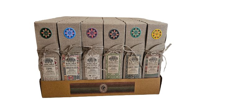Packaged items with decorative labels on a cardboard display