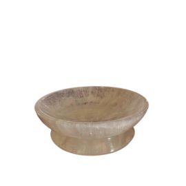 Round stone table on a white background