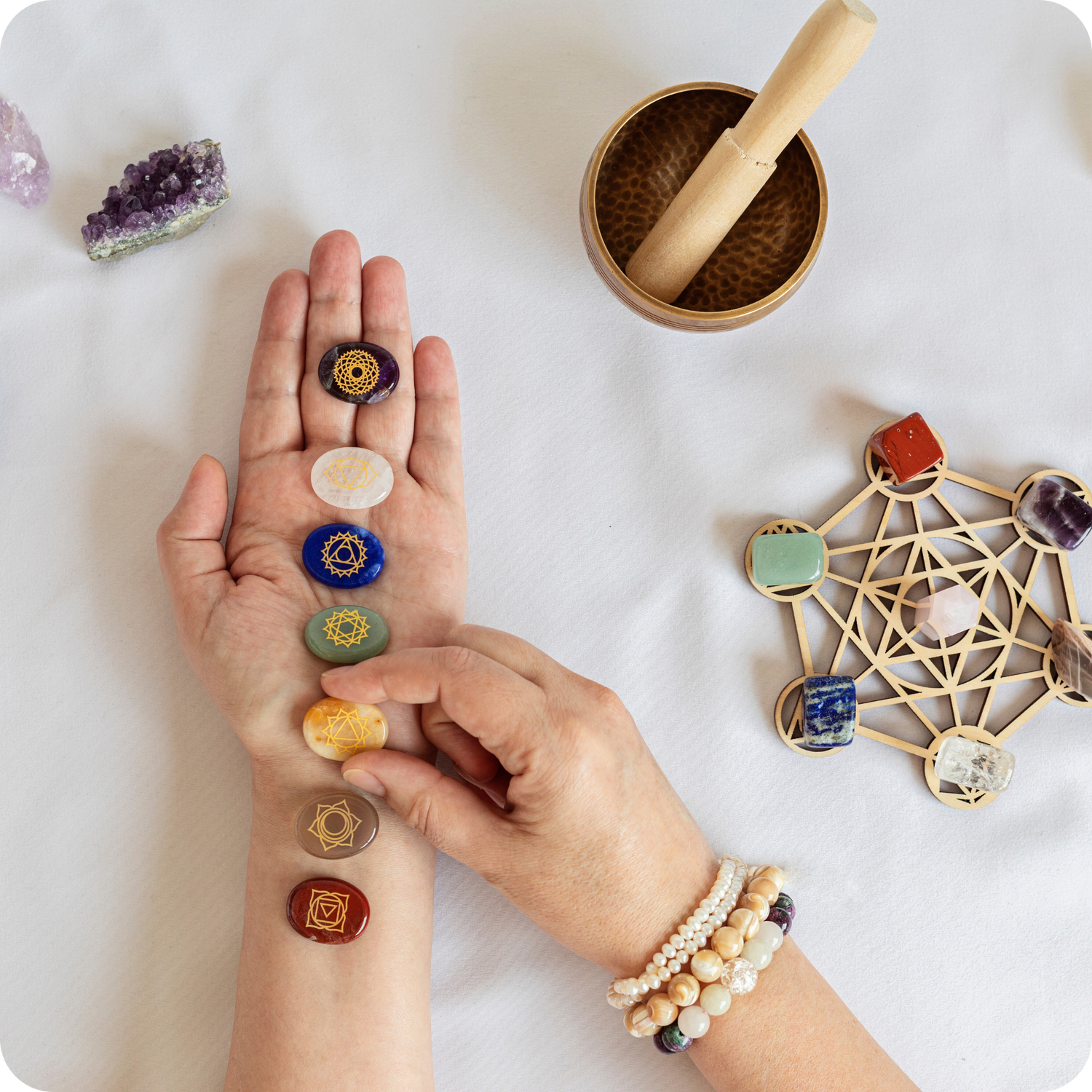 A curated selection of spiritual tools, including sage, incense, and crystals, to enhance mindfulness and spiritual practices.