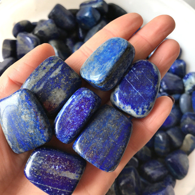 Natural Lapis Lazuli crystal with deep blue hues and golden flecks, ideal for healing, meditation, and spiritual growth.