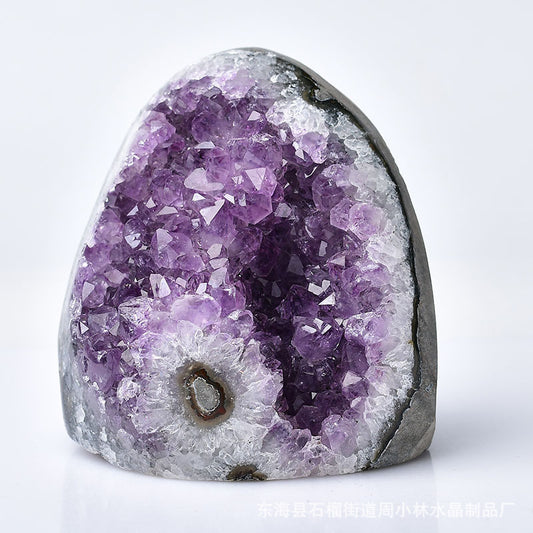 Amethyst crystal cluster, a decorative gemstone ideal for enhancing home decor with natural elegance.