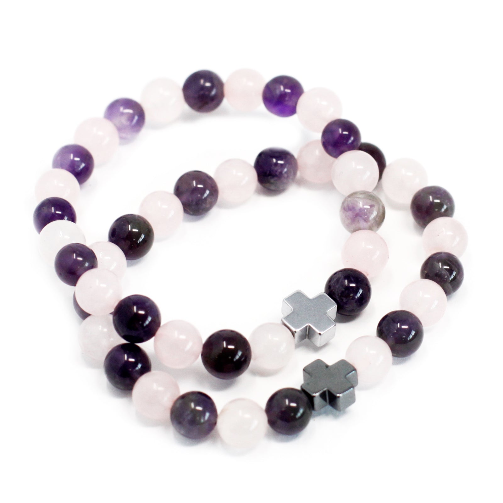 Close-up image of Gemstone Friendship Bracelets showcasing Amethyst and Rose Quartz beads. Stretchable, one-size-fits-all design for friendship and love.