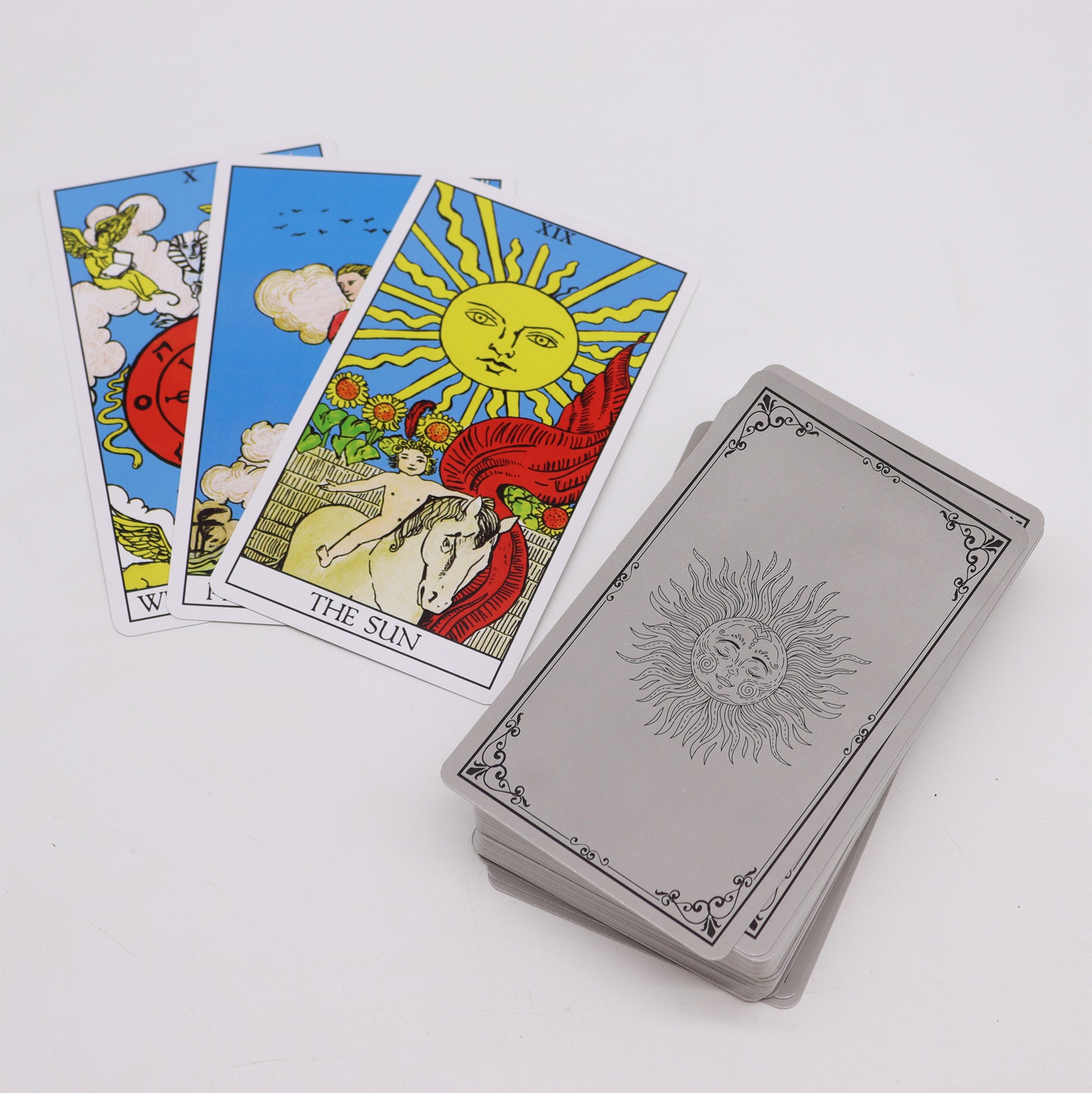 A beautifully designed Traditional Tarot Card Deck featuring intricate artwork, with the classic Major and Minor Arcana cards and accompanying guidebook for divination.