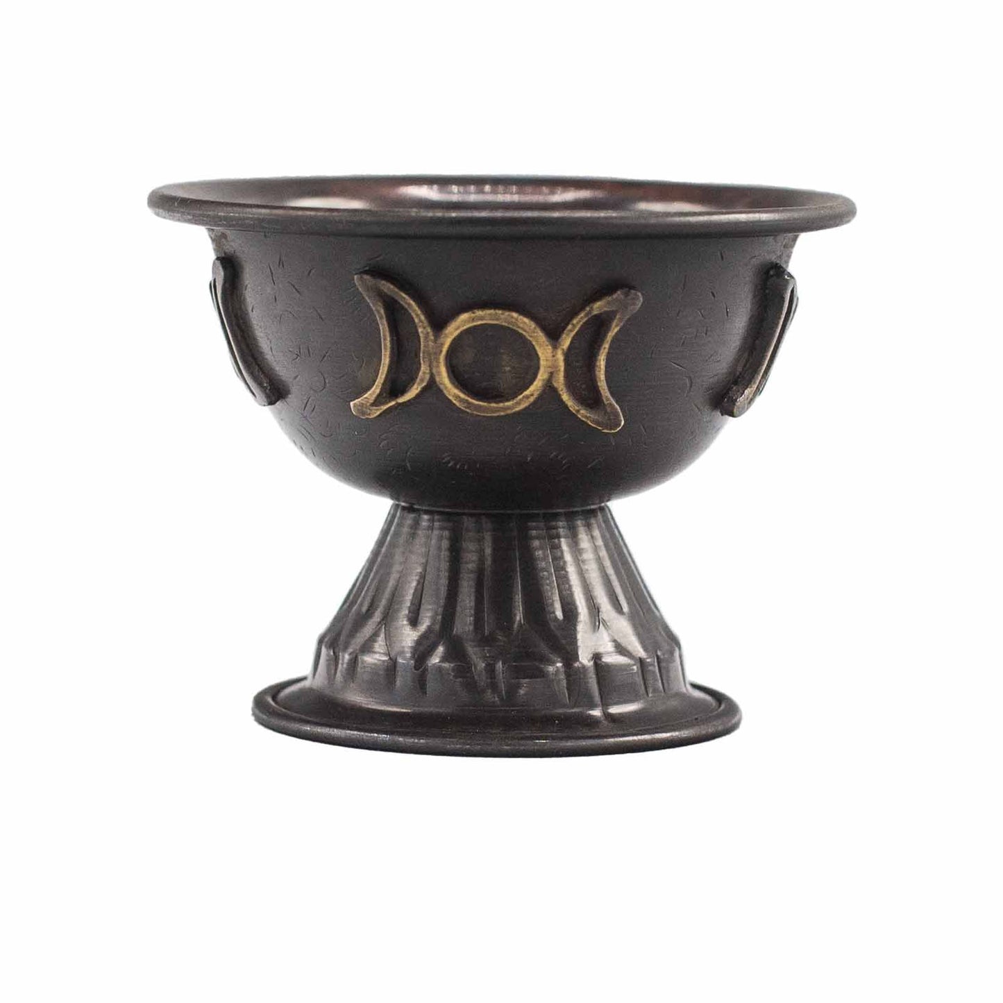 Black ceramic bowl with gold moon phase design on a white background