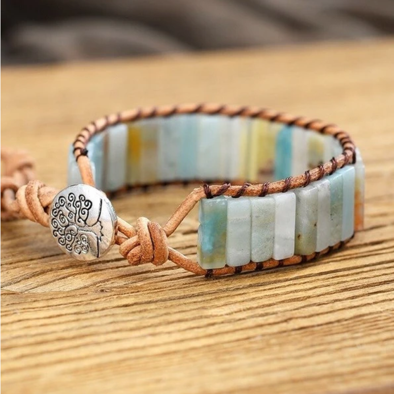 Chakra Healing Yoga Bracelet displayed with a tree symbolizing nature and spiritual balance